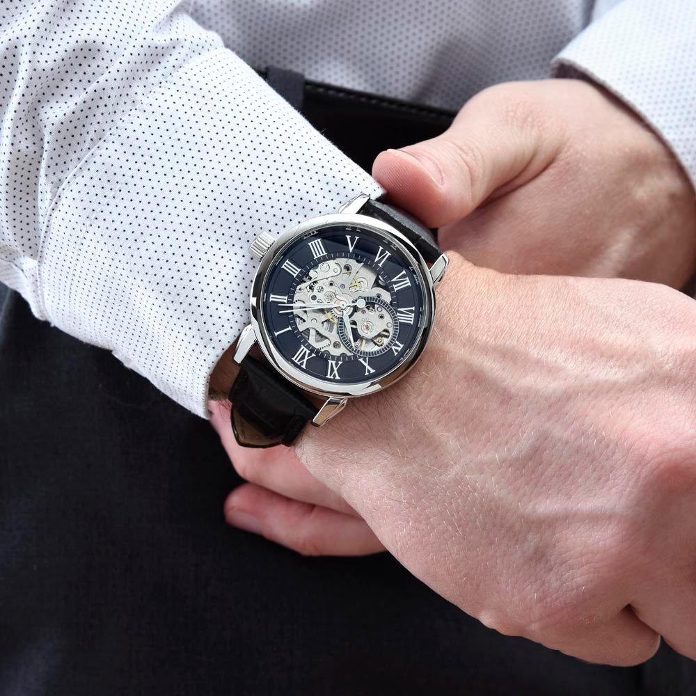 Close up of a man wearing a watch