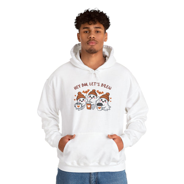 Person wearing a white hoodie with ghost and coffee cup design on a white background