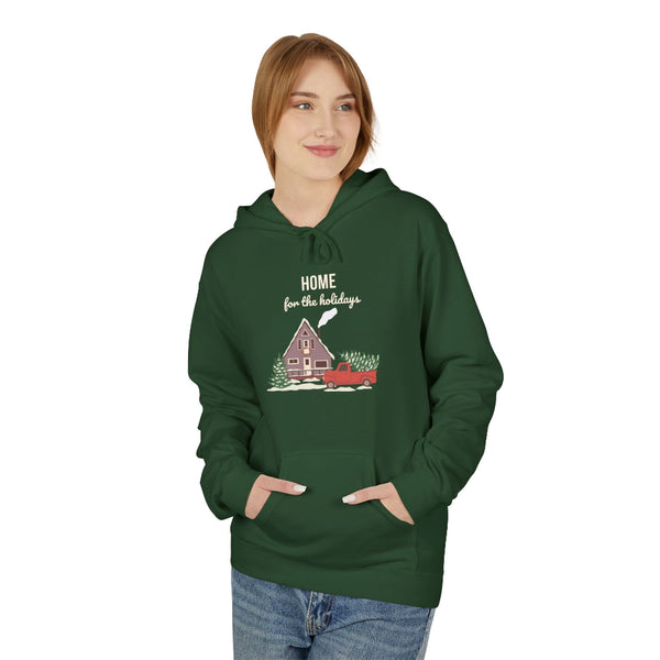 Person wearing a green hoodie with a festive design on a white background
