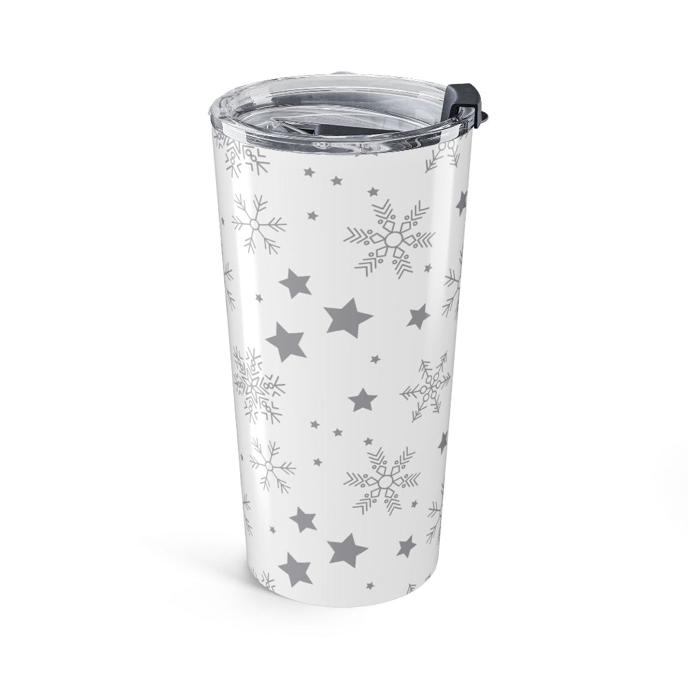 White tumbler with gray snowflakes and stars on a white background