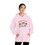Person wearing a pink hoodie with cartoon characters and text on a white background