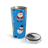 Tumbler with Christmas design featuring Santa Claus, reindeer, and snowman on a blue background.