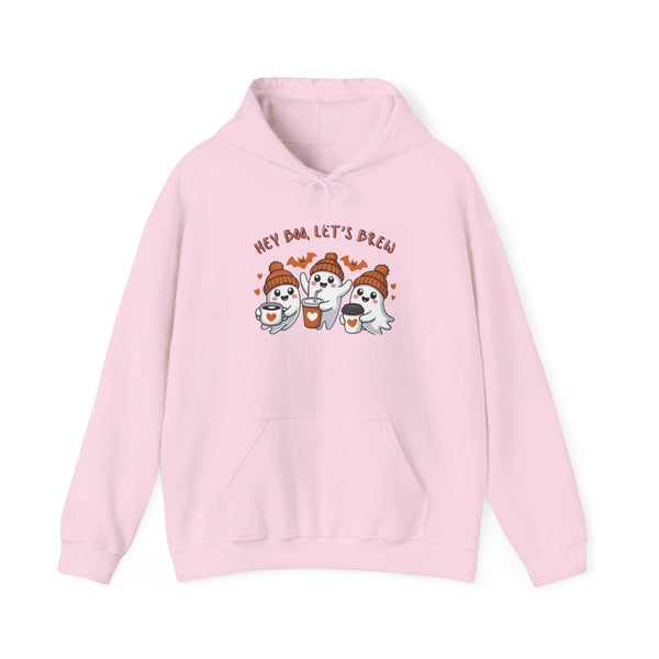 Pink hoodie with cartoon ghosts and text on a white background