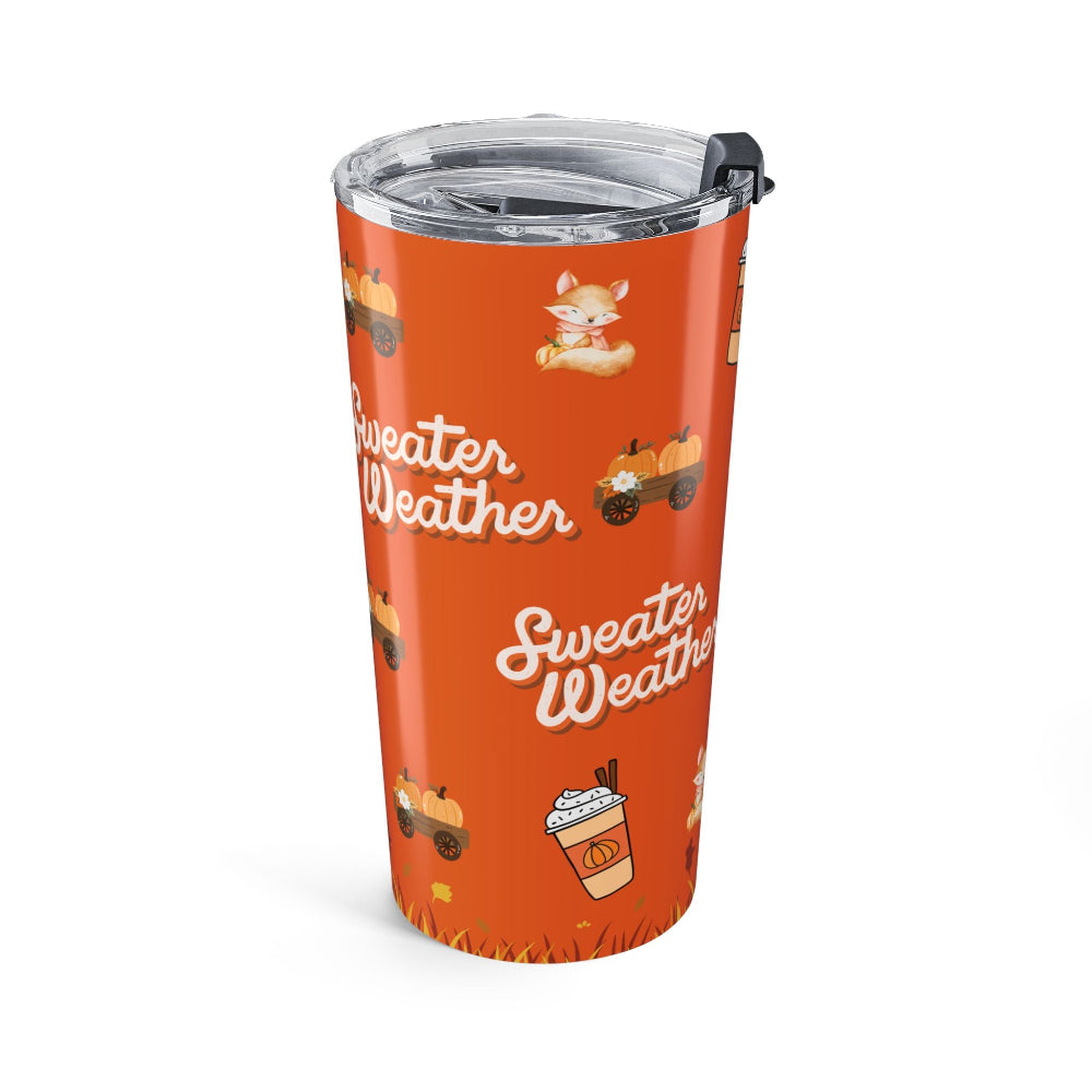 Orange tumbler with 'Sweater Weather' text and autumn-themed illustrations on a white background