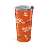 Orange tumbler with 'Sweater Weather' text and autumn-themed illustrations on a white background