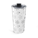 Clear tumbler with snowflake pattern on a white background