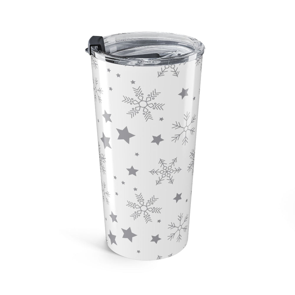 Tumbler with snowflake and star pattern on a white background