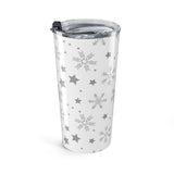 Tumbler with snowflake and star pattern on a white background