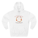 White hoodie with autumn-themed design on a white background
