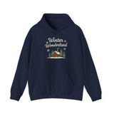 Navy blue hoodie with 'Winter Wonderland' text and cabin graphic on a white background