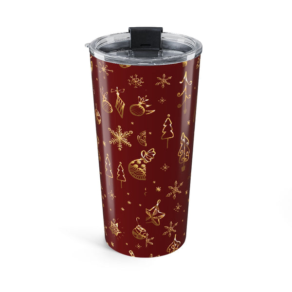 Red tumbler with gold Christmas patterns on a white background