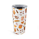Tumbler with autumn-themed design on a white background