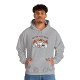 Person wearing a gray hoodie with cartoon ghosts and text on a white background