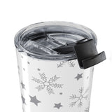 Clear tumbler with snowflake and star pattern on a white background