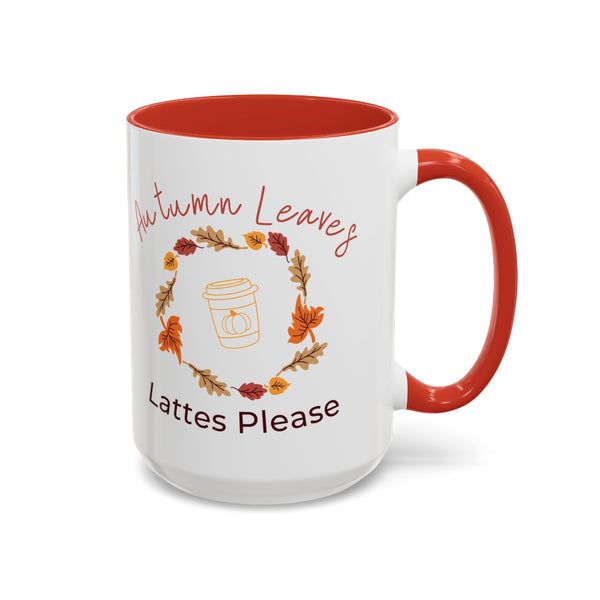 White mug with red interior and handle, featuring autumn-themed text and graphics.