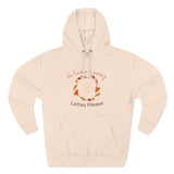 Beige hoodie with autumn-themed design on a white background