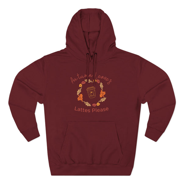 Maroon hoodie with autumn-themed design and text on a white background