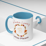 Mug with blue interior and handle, featuring autumn-themed design and text.