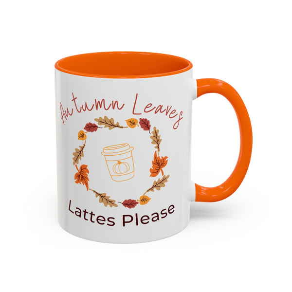 Mug with autumn-themed design and orange interior and handle on a white background