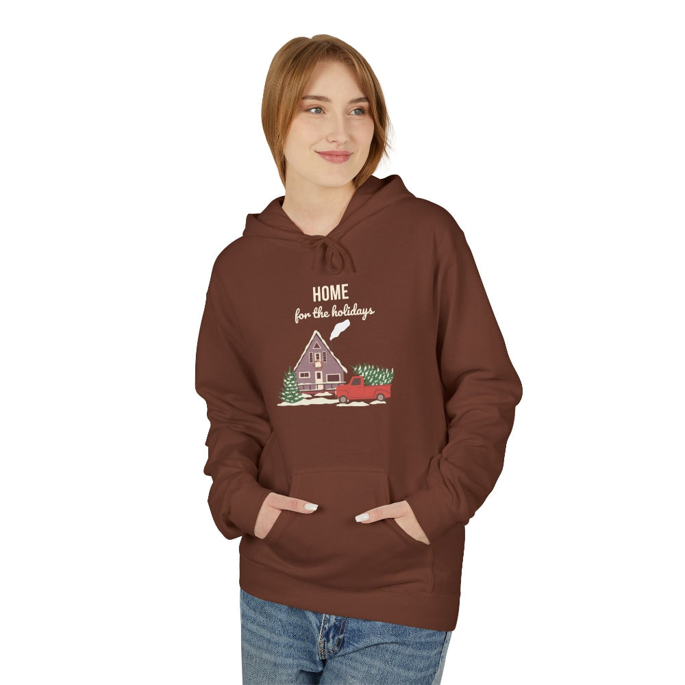 Person wearing a brown hoodie with a festive design on a white background