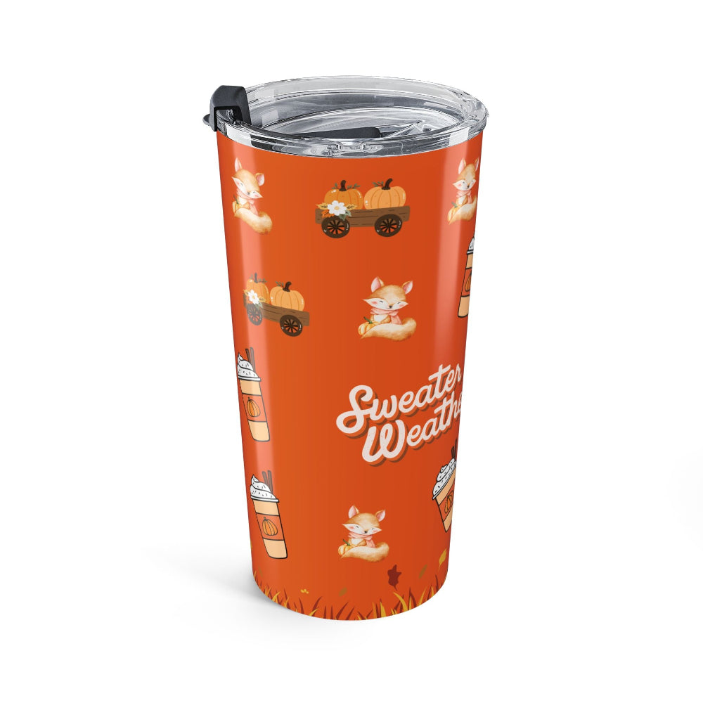 Orange tumbler with autumn-themed design and 'Sweater Weather' text on a white background