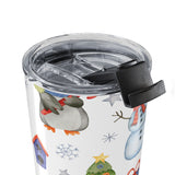 Clear tumbler with Christmas-themed design featuring penguins and snowmen on a white background