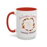 White mug with red interior and handle, featuring autumn-themed design and text.