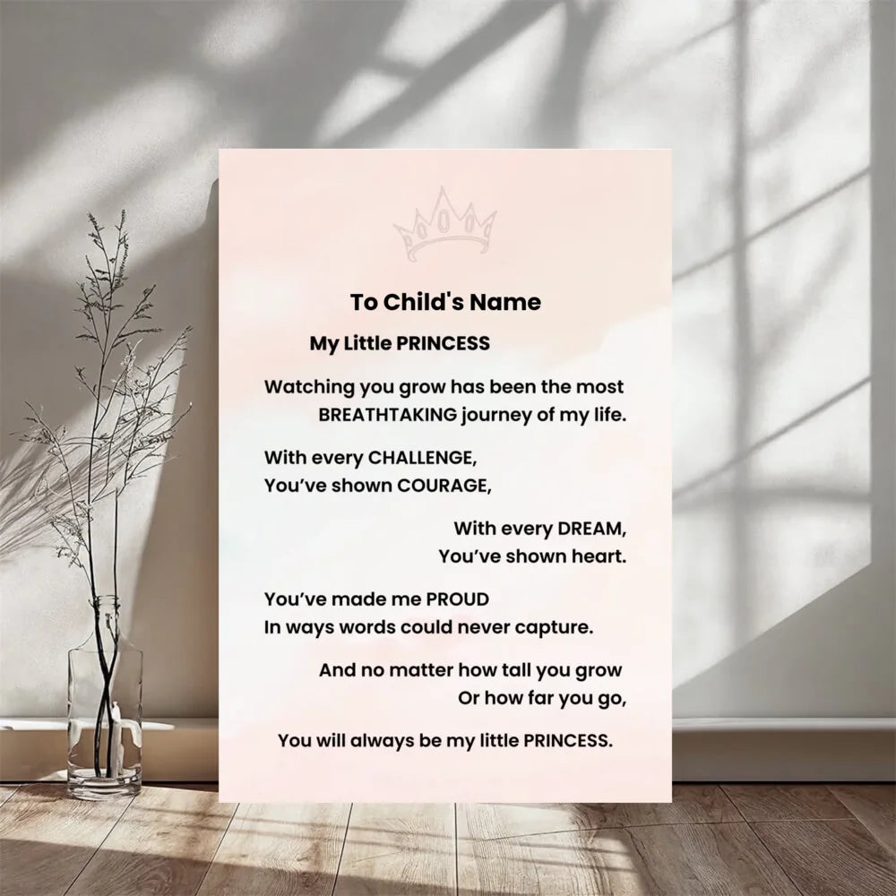 A vertical printed card with a sweet 'To Child's Name' poem titled 'My Little PRINCESS' stands against a sunlit wall. The card has a very pale blush pink background with black text and a small crown illustration at the top.