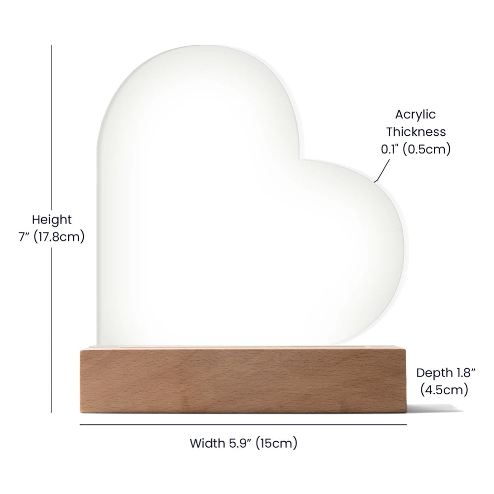 Heart-shaped object with measurements on a white background