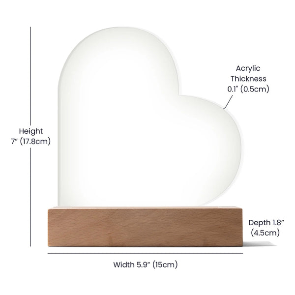 Heart-shaped object with measurements on a white background