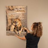 A woman holds a large custom canvas print of a lion and cub on a beige wall. The canvas features a custom poem titled 'My Little LIONESS, Love, Dad!' with a photo of a lion and cub.