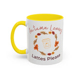 Mug with yellow interior and handle, featuring autumn-themed design and text.