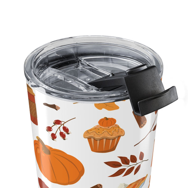 Tumbler with autumn-themed design on a white background