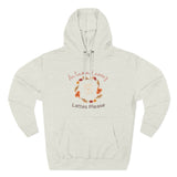 Beige hoodie with autumn-themed design on a white background