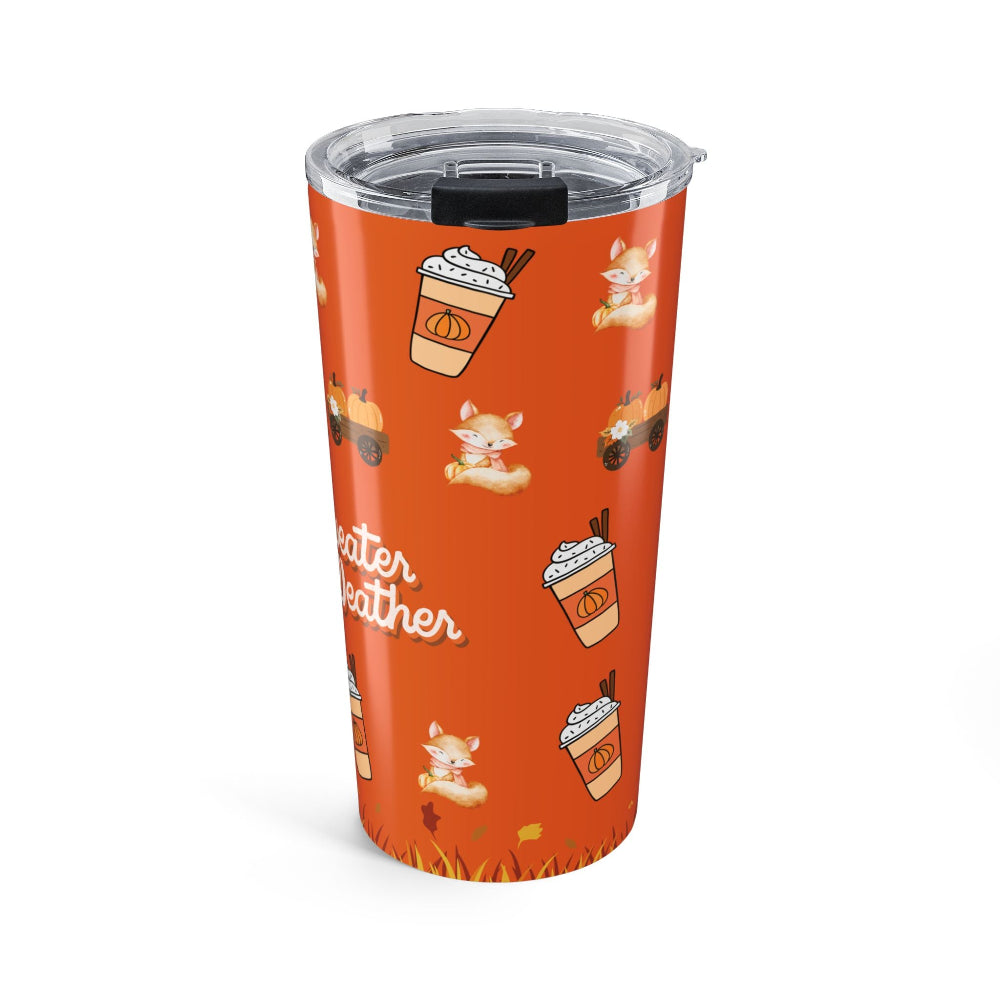 Orange tumbler with coffee cup and fox pattern on a white background