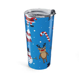 Christmas-themed tumbler with reindeer, candy canes, and snowmen on a blue background