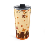 Tumbler with autumn leaf design on a beige background