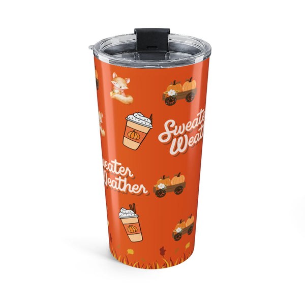 Orange tumbler with autumn-themed illustrations and text on a white background