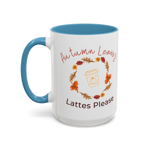 White mug with blue interior and handle, featuring autumn-themed design and text.