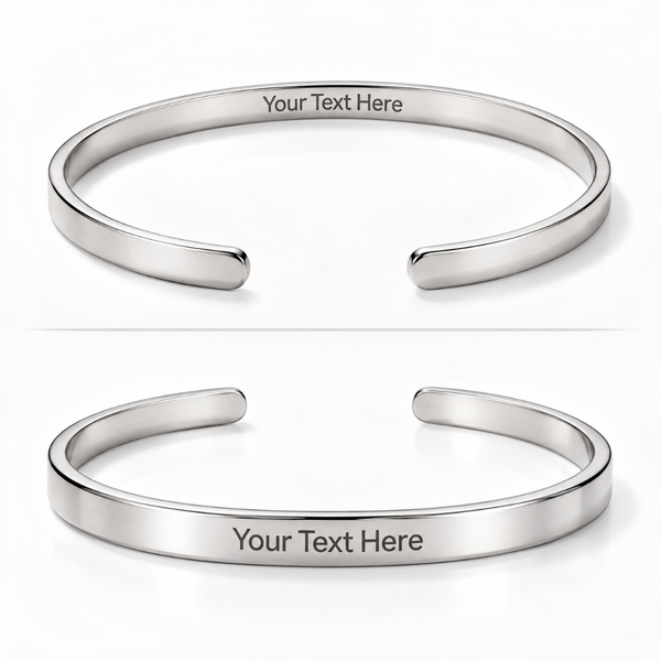 Two polished silver-tone open cuff bracelets shown on a white background, each with the text 'Your Text Here' engraved on the inside.