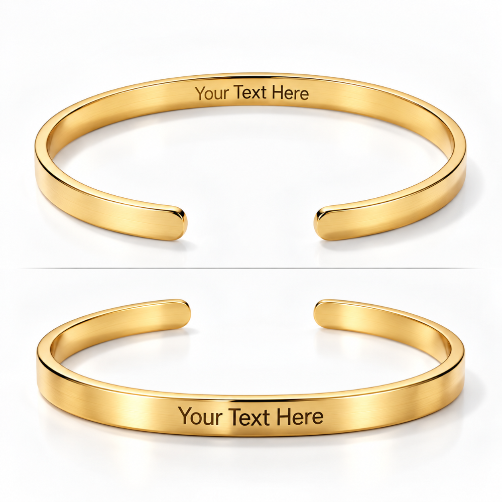 Two polished gold open cuff bracelets shown on a white background, one above the other, each with the engraved placeholder text 'Your Text Here' on the inside.
