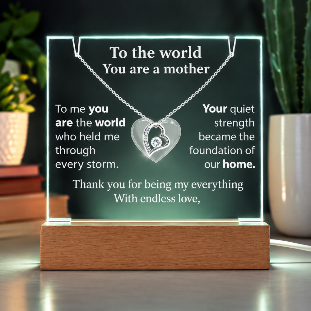 Silver heart pendant necklace displayed on an illuminated acrylic gift plaque for Mom, featuring a heartfelt message of love and gratitude on a wooden LED base.