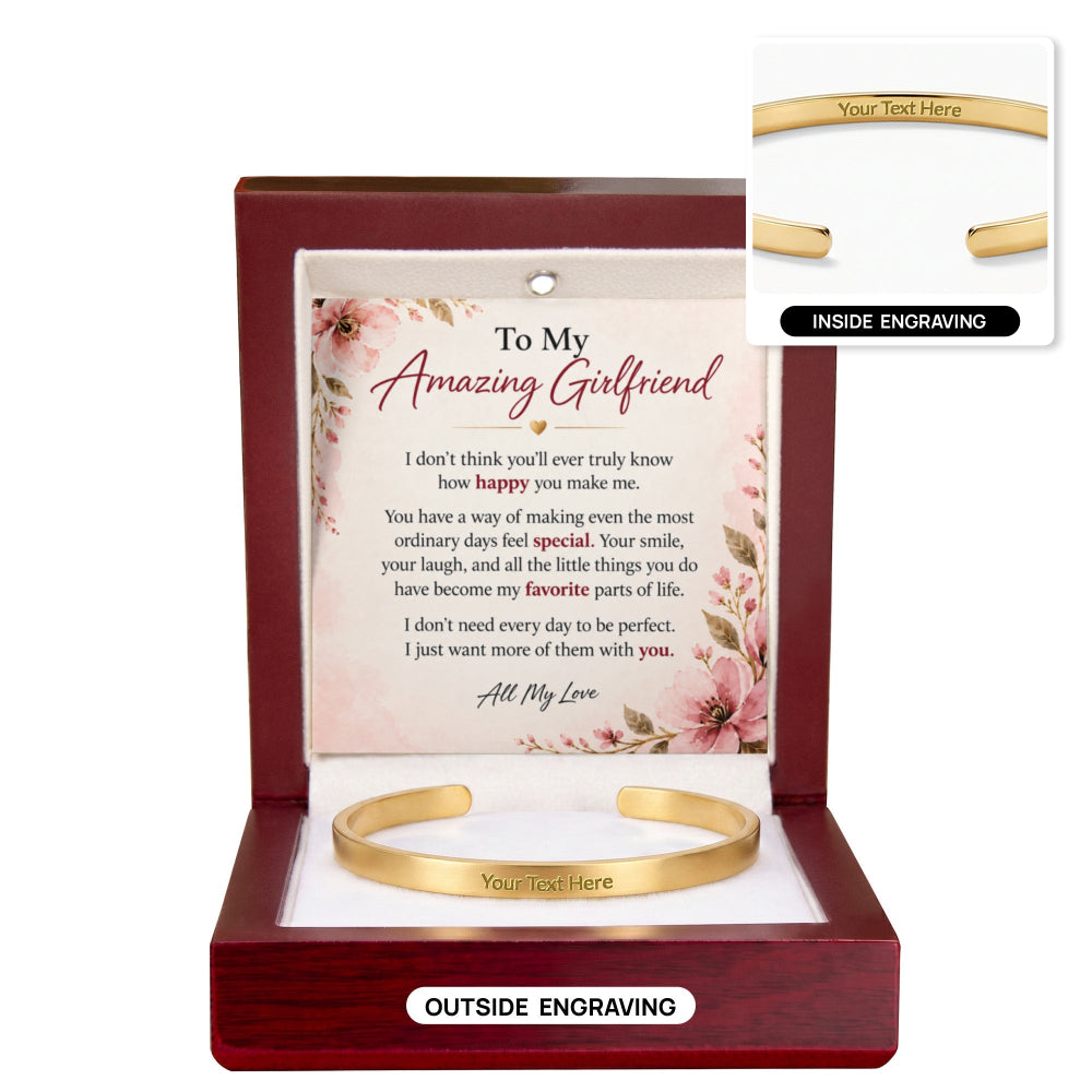 A gold open cuff bracelet presented in a dark wood gift box with a floral message card. The image shows both the outside engraved bracelet view and an inset labeled inside engraving.