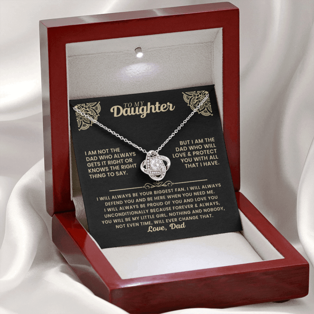 A personalized necklace gift set for a daughter, featuring a silver heart-shaped pendant necklace with a clear stone, displayed on a black printed message card inside a red wooden presentation box with a white satin background.