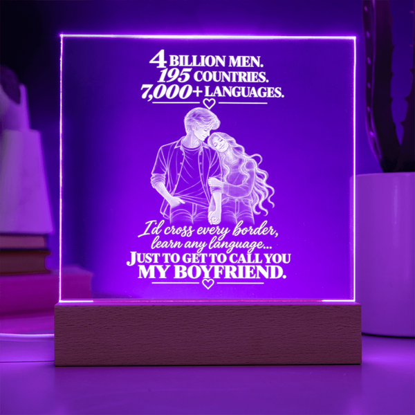 A rectangular acrylic LED lamp glowing with purple light on a wooden base, featuring white engraved text and an illustration of a couple with hearts. The message reads, 'I CHOSE YOU without knowing where life would take us.