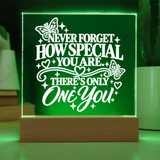 Encouraging gift for daughter illuminated with green LED light