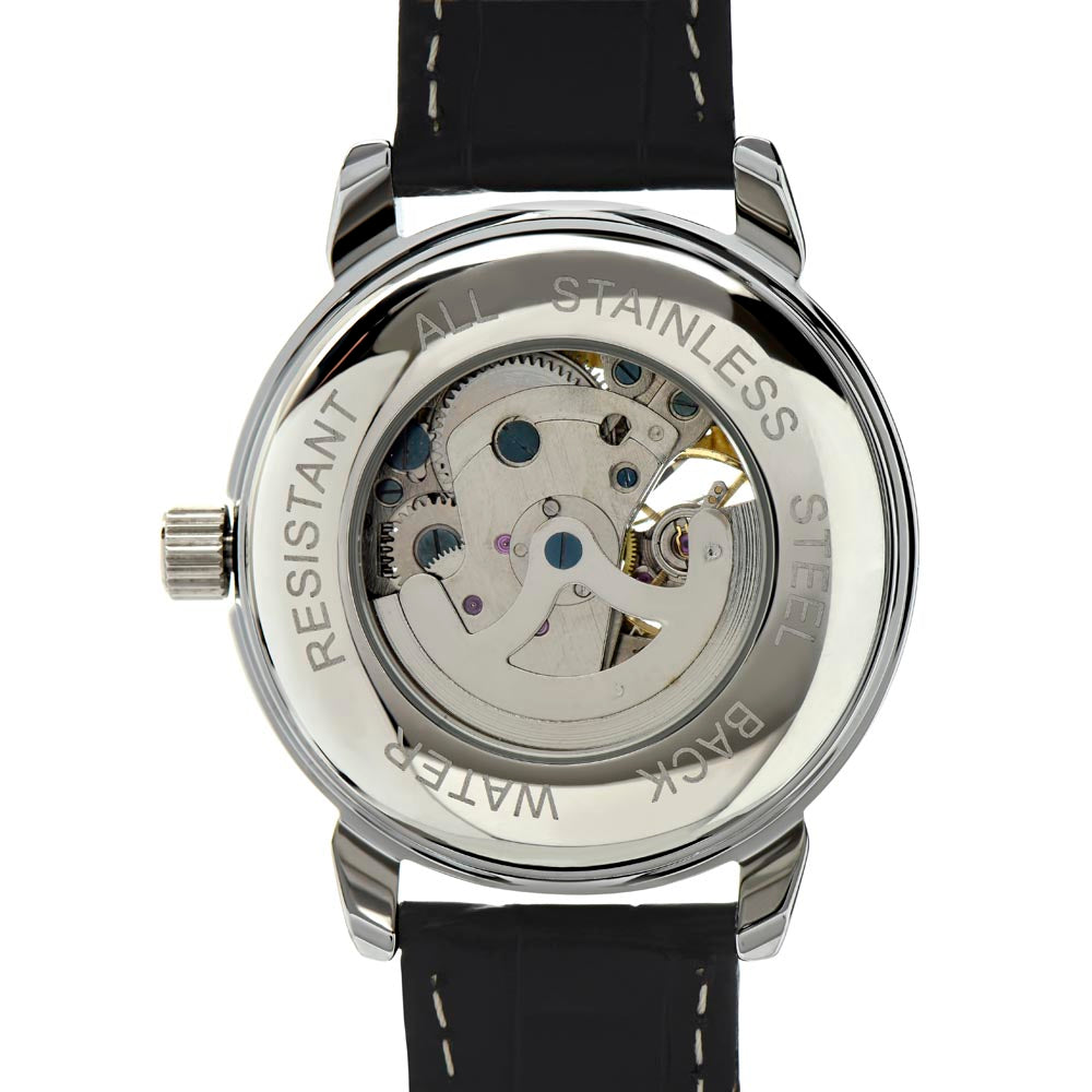 Back of automatic skeleton watch showing the visible mechanical movement through the case