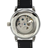 Back of automatic skeleton watch showing the visible mechanical movement through the case