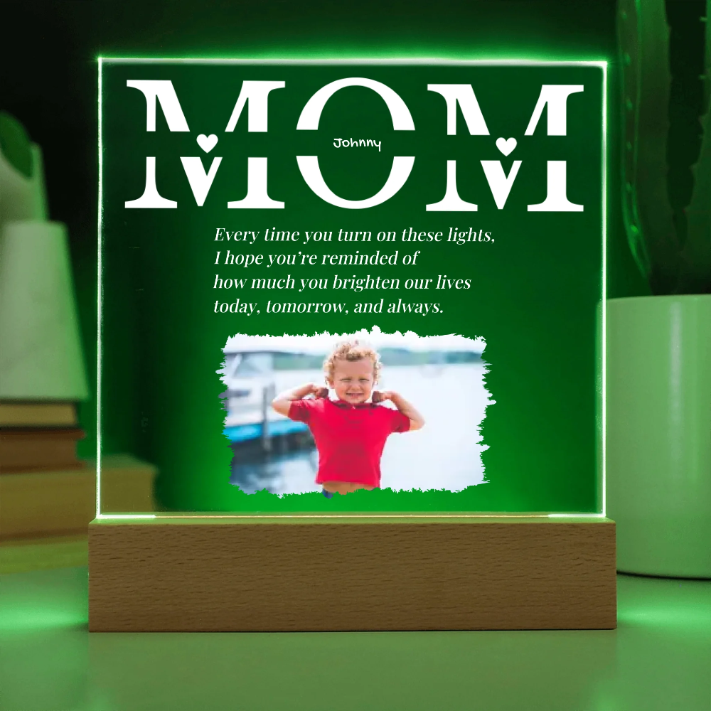 Personalized light box with 'MOM' text and a photo of a child on a green background