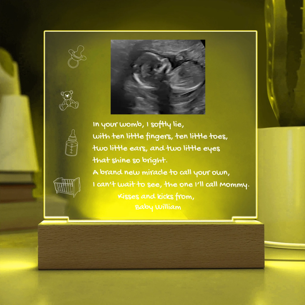 Decorative sign with ultrasound photo and text on a green background